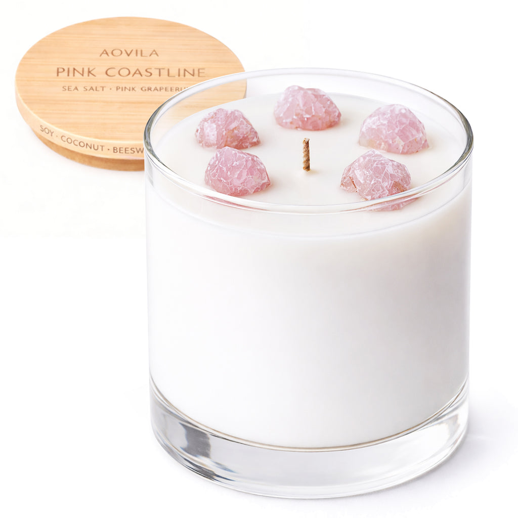 AOVILA Pink Coastline scented candle with sea salt and pink grapefruit fragrance, topped with natural rose quartz crystal